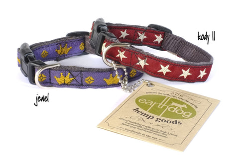 two dog collars one red with white stars one blue with yellow 